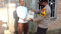 Polsek Cempaka Polda Sumsel Bagikan Paket Sembako Pada Masyarakat Yang Membutuhkan